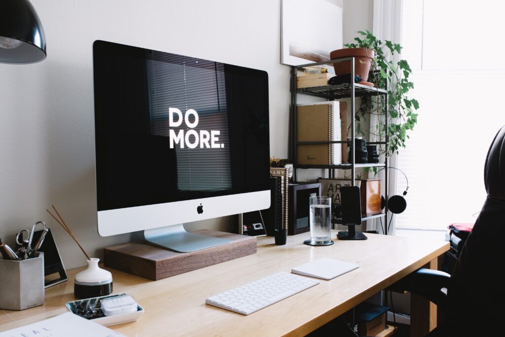 Article Header Image About Productivity - Work Station with Do More on Mac Book screen